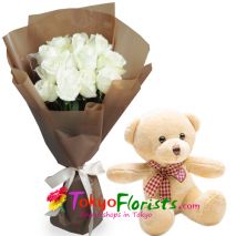 send a soft cuddly teddy bear with white roses in a bouquet to tokyo